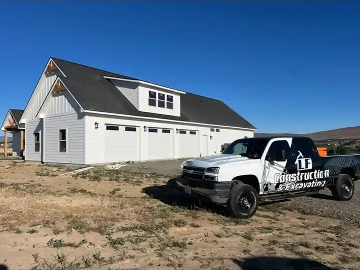 White home with an LF truck parked out front